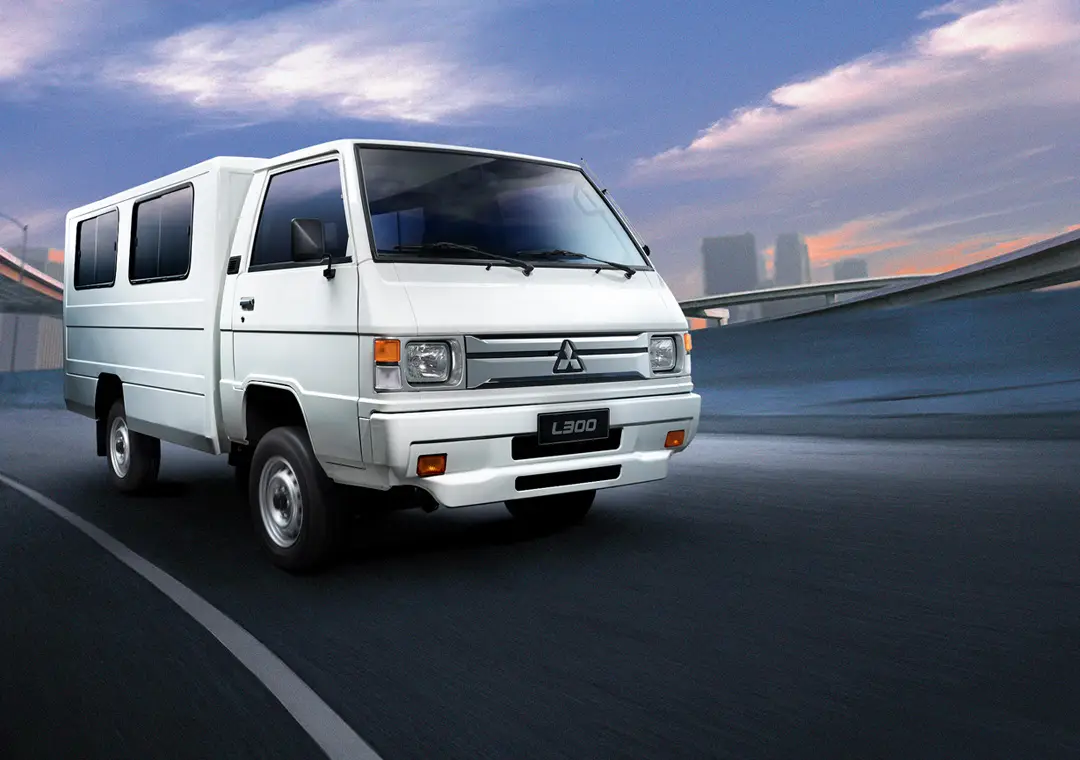 Mitsubishi Montero Sport photographed in a dark studio setting